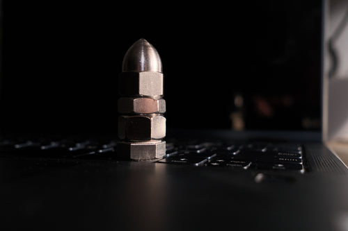 Desk Bolts — The No-Tech Key Weight